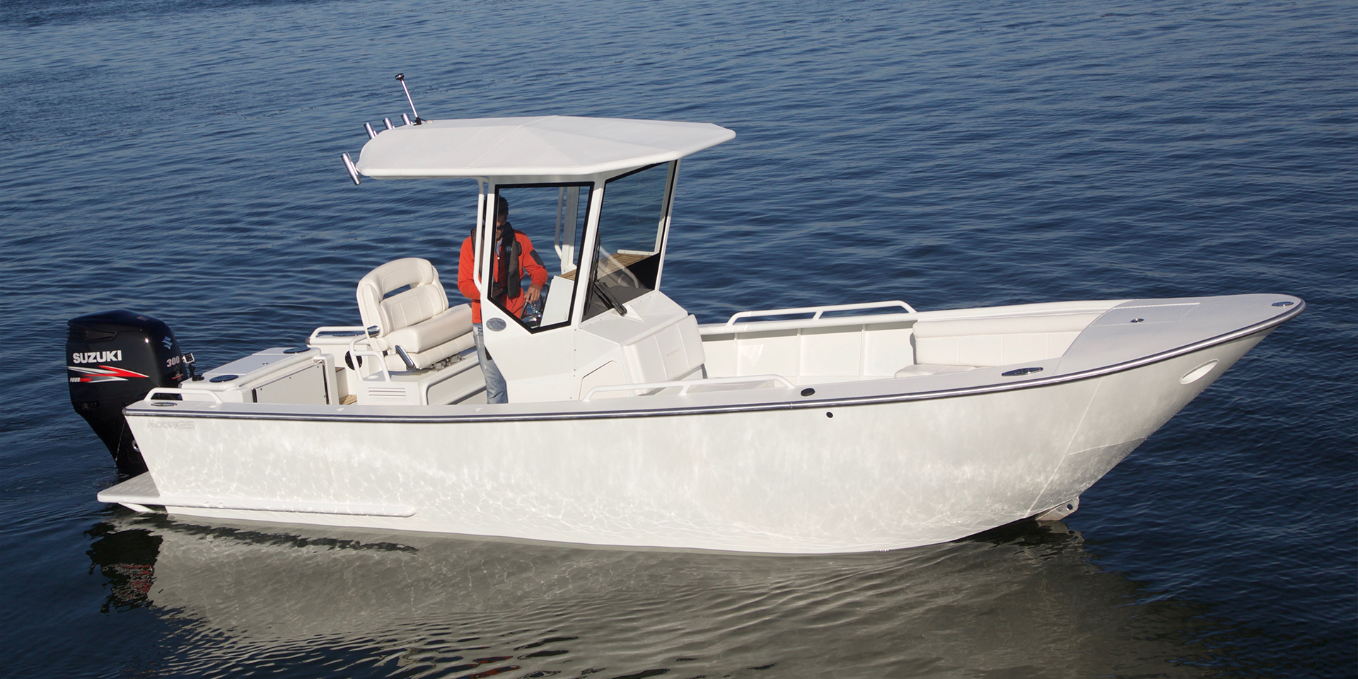 white Moore 25 boat