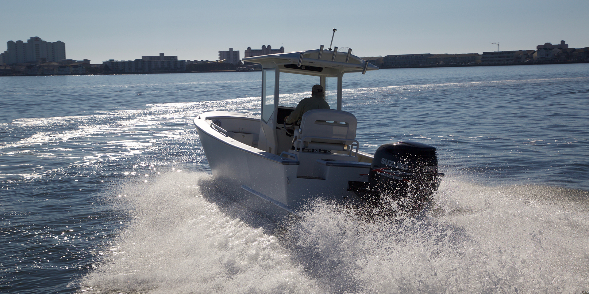 White boat in water Ocean City